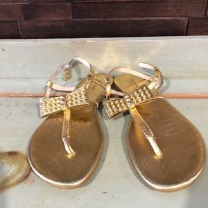 MK gold sandals
